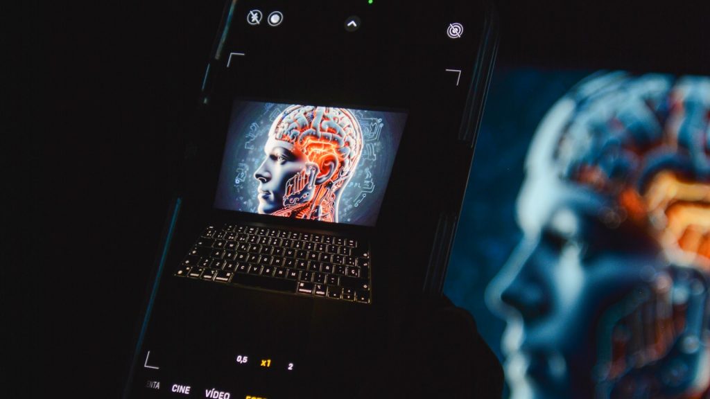 Smartphone displays an AI brain visualization, symbolizing the OpenAI hardware partnership with Qualcomm