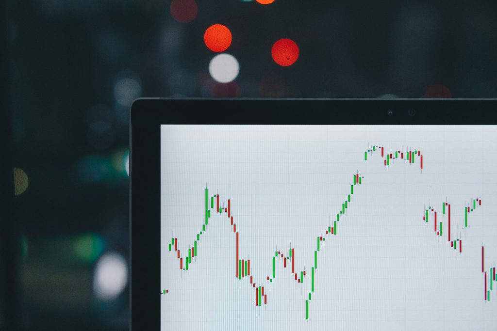 Stock chart on laptop showing six-week rally to new all-time highs May 2026